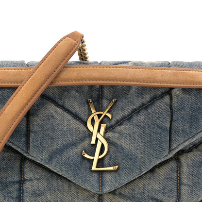 Denim quilted puffer satchel flap with gold YSL logo and tan leather strap