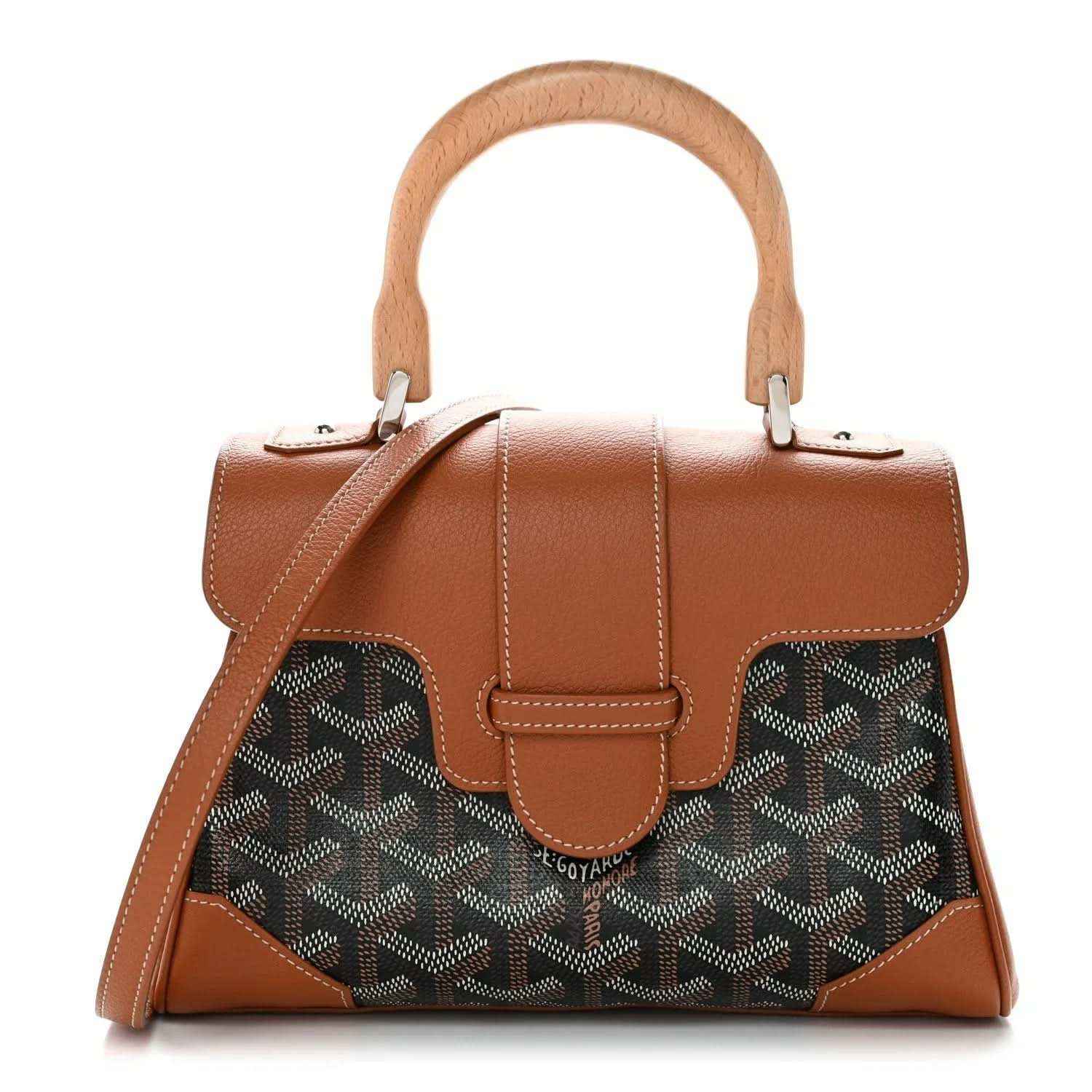 Mini shoulder bag with top handle and strap, dark patterned canvas with tan leather trim