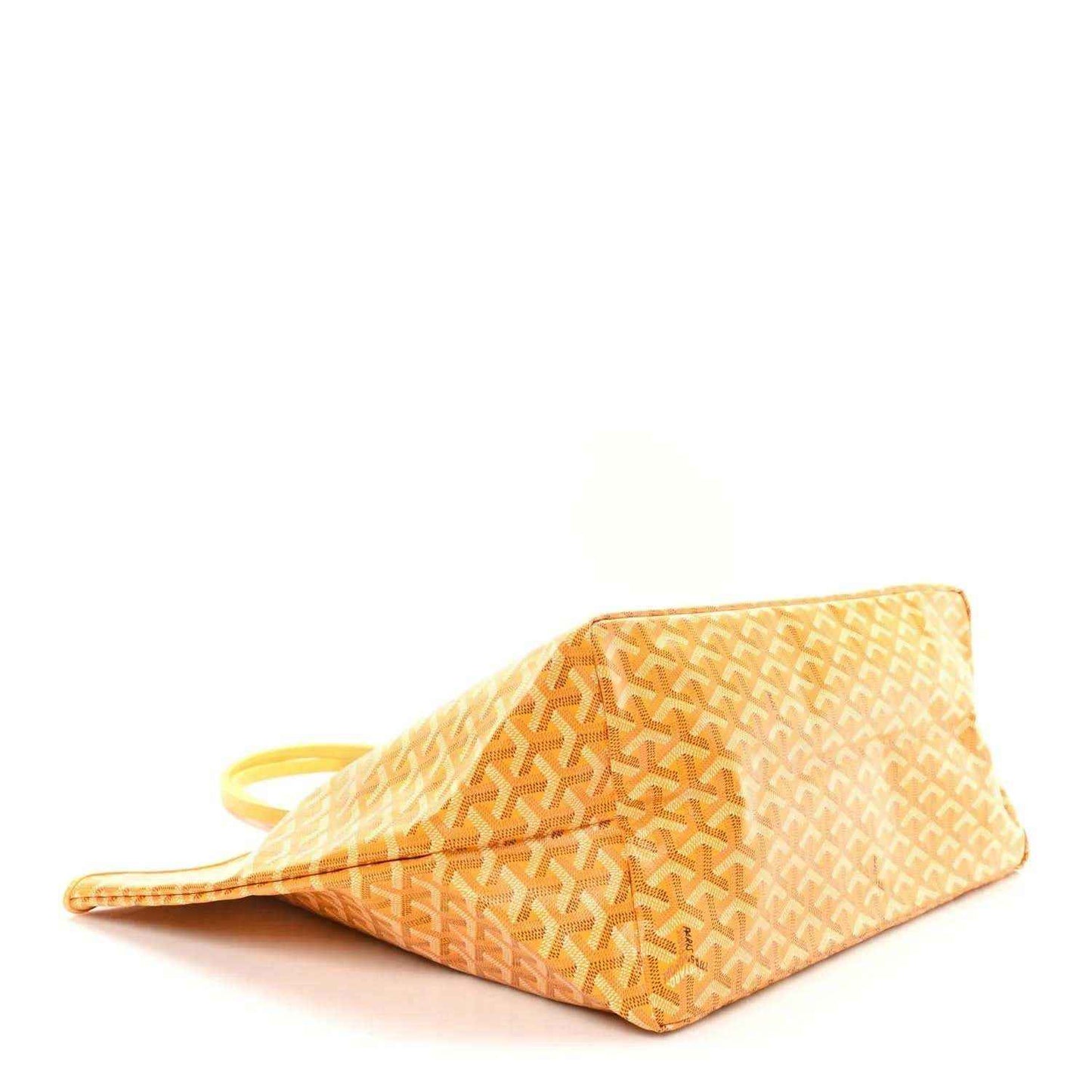 Yellow canvas tote bag with Goyardine pattern, laid on side