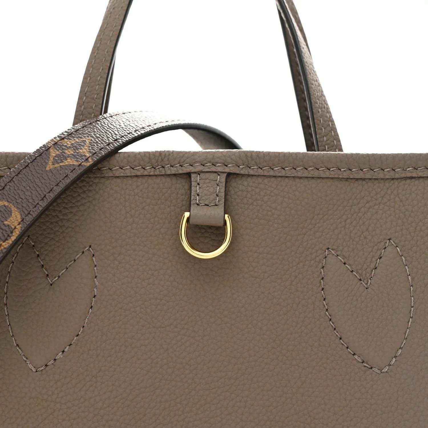 Gray leather top section with gold-tone O-ring and stitched heart motif detail