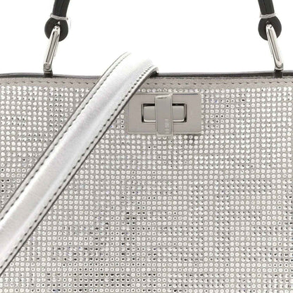 Silver crystal satchel front with square clasp and top handle hardware
