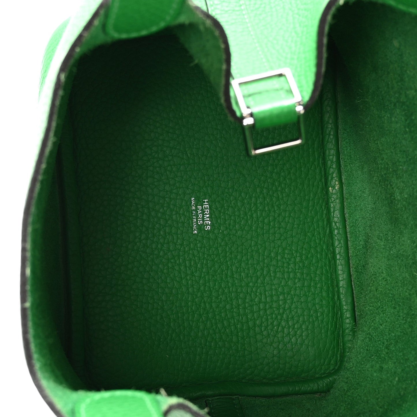 Green leather tote interior with label and front lock hardware