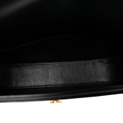 Black leather crossbody bag interior lining with neat stitching and inner trim edge.