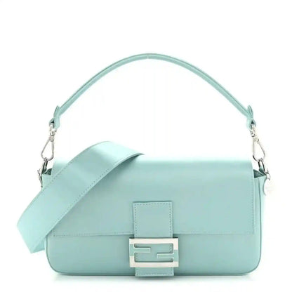 Blue satin nappa baguette bag with top handle and front clasp hardware