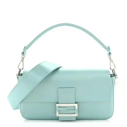 Blue satin nappa baguette bag with top handle and front clasp hardware
