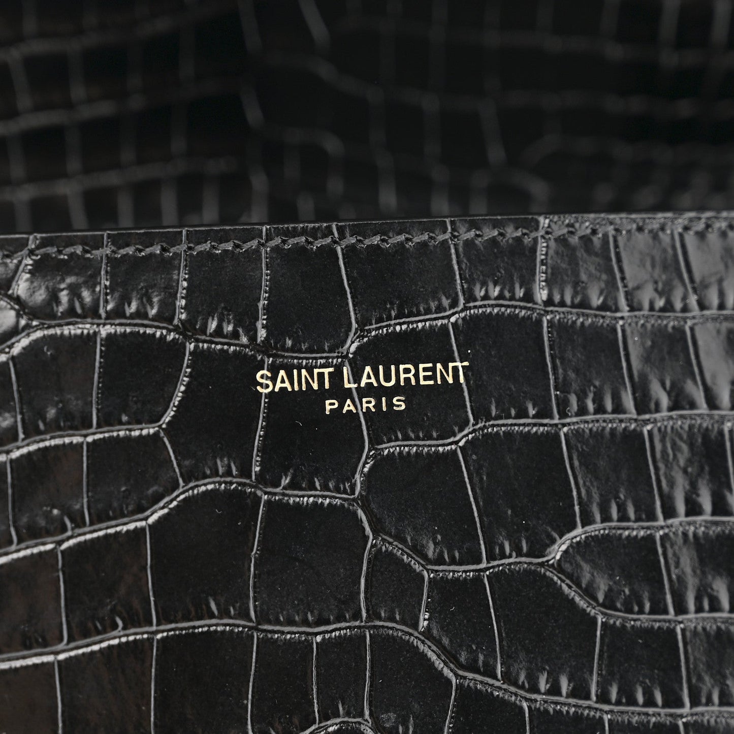 Crocodile-embossed black leather with SAINT LAURENT PARIS branding