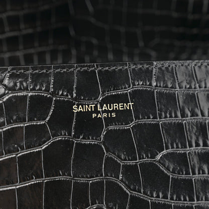 Crocodile-embossed black leather with SAINT LAURENT PARIS branding