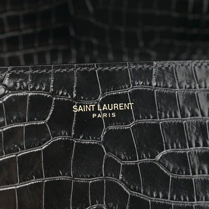 Crocodile-embossed black leather with SAINT LAURENT PARIS branding