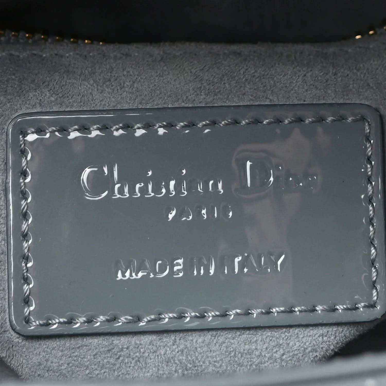 Light blue mini Lady Dior bag leather logo label inside with decorative stitching