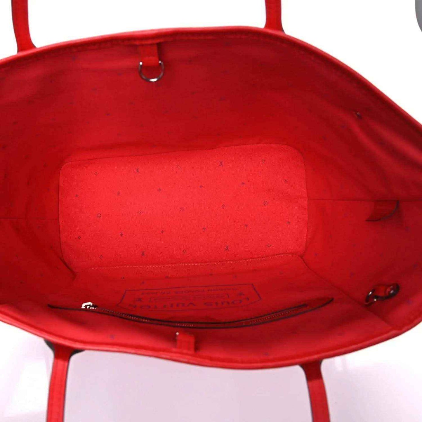 Louis Vuitton tote bag interior with red lining and inner zip pocket