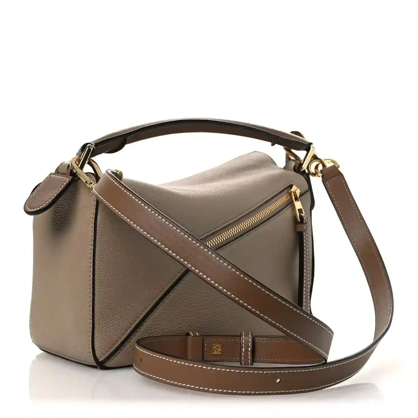 Small Puzzle bag front with zip pocket, crossbody strap, sand leather with dark trim