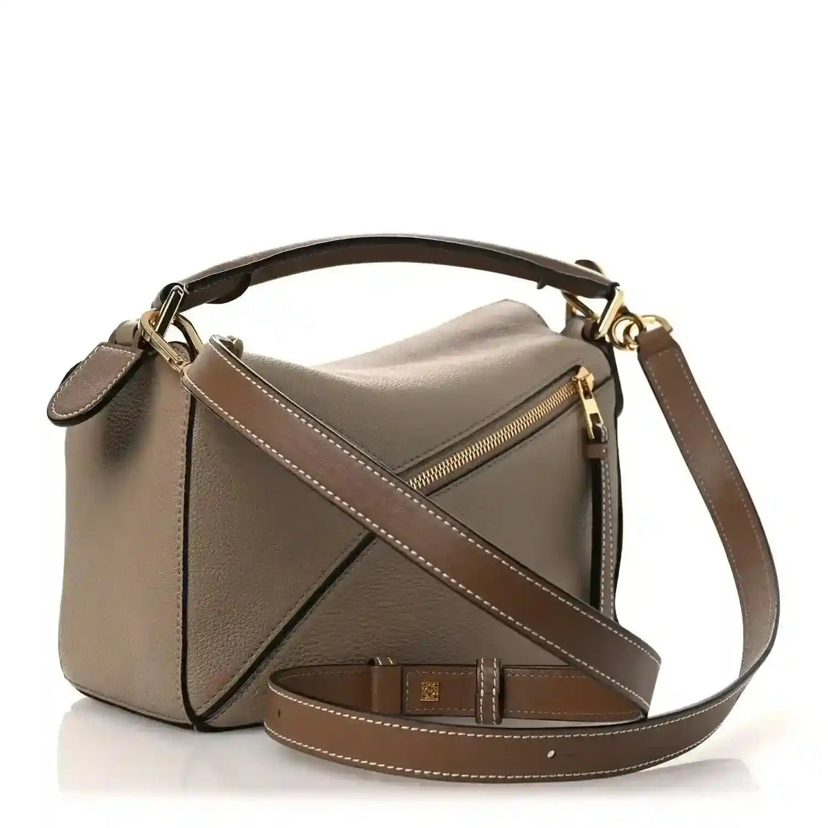 Small Puzzle bag front with zip pocket, crossbody strap, sand leather with dark trim