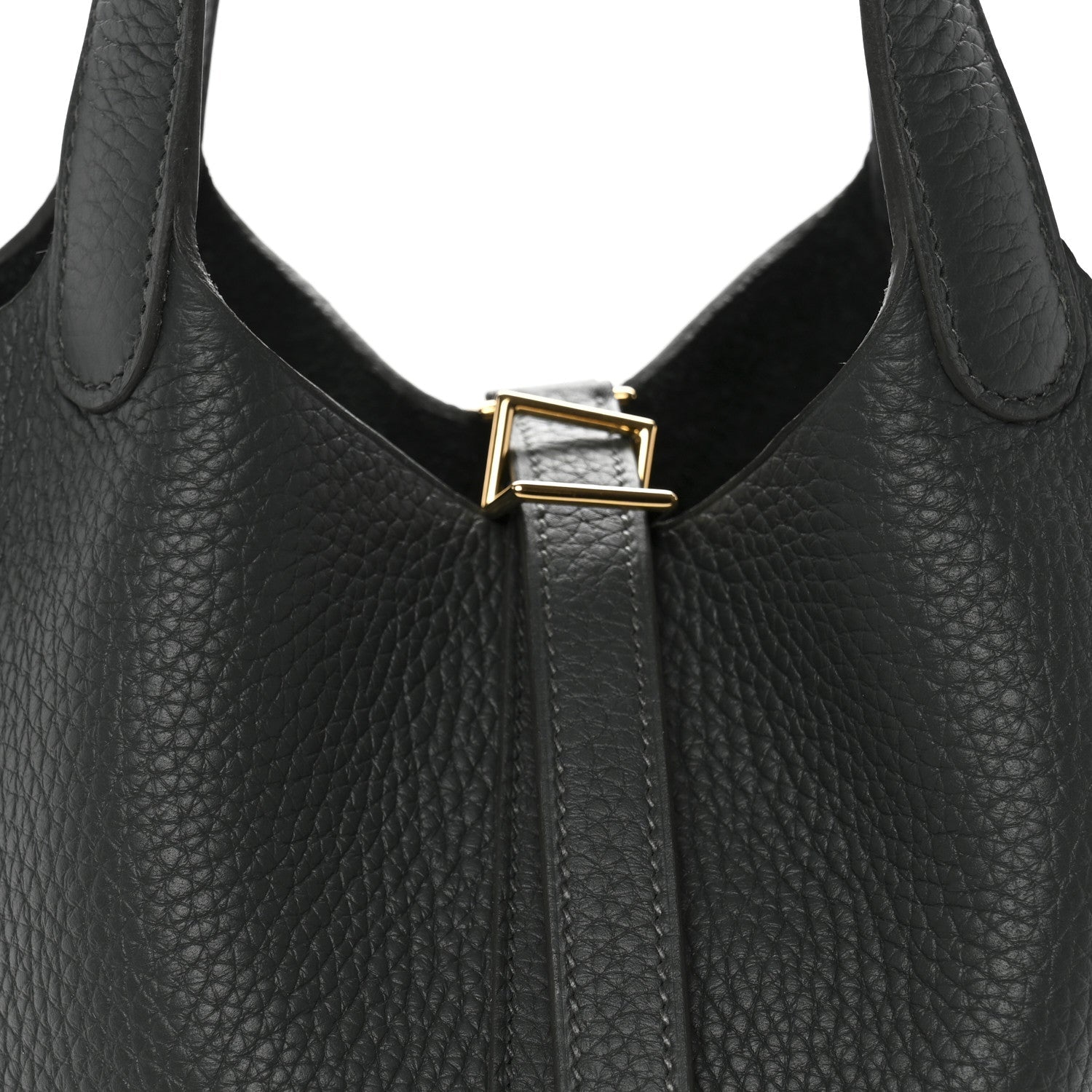Front view of dark green textured tote with gold-tone bar lock and handle openings.