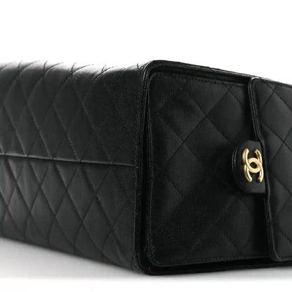 Black quilted leather medium flap handbag with gold-tone CC clasp