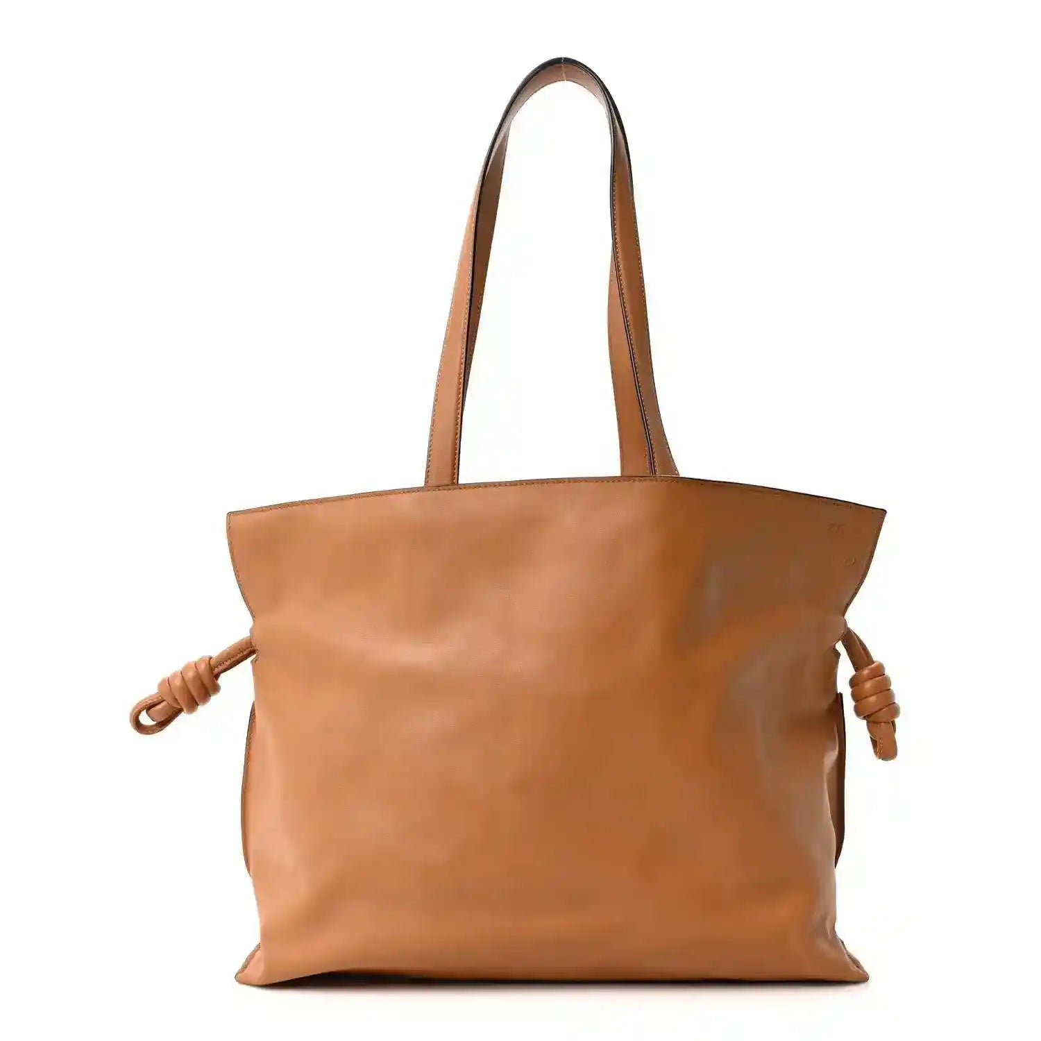 Loewe large Flamenco knot bag in warm tan leather, two top handles and braided side ties.