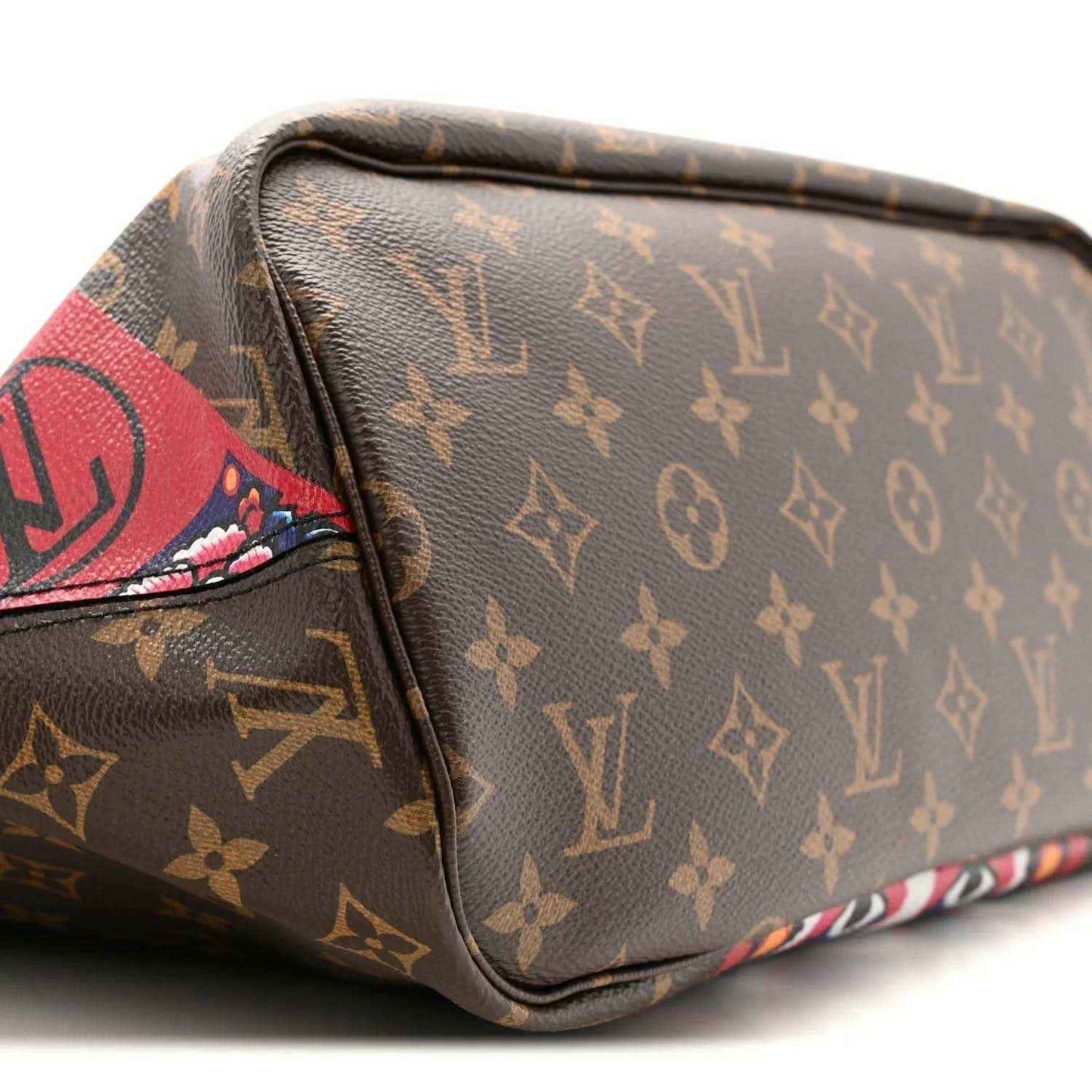 Brown monogram mini bag with colorful edge patch and rounded corner seams