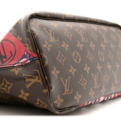 Brown monogram mini bag with colorful edge patch and rounded corner seams