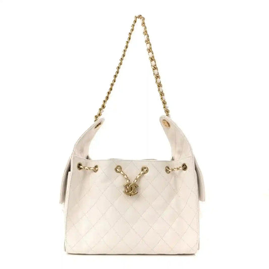 White quilted caviar leather mini bag with gold-tone chain handles
