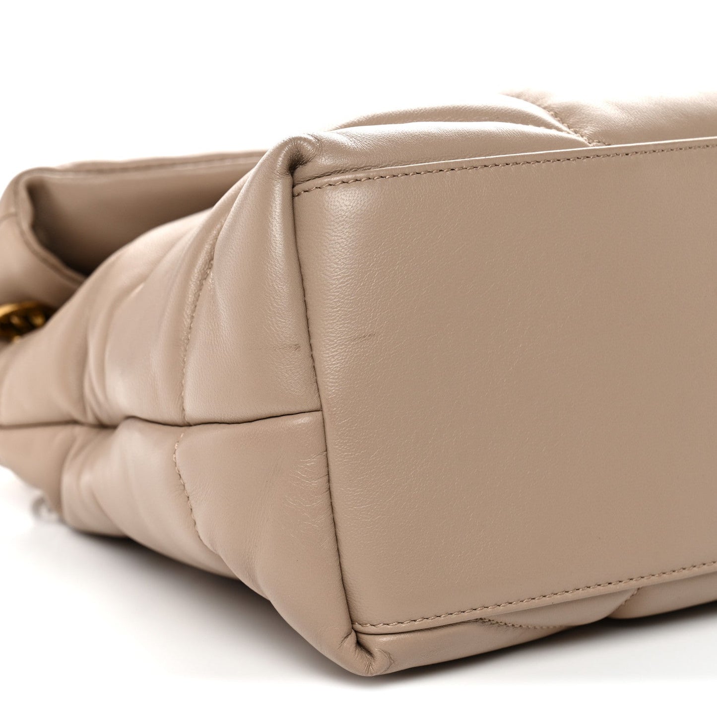 Dark beige puffer quilted satchel corner detail with gold chain attachment