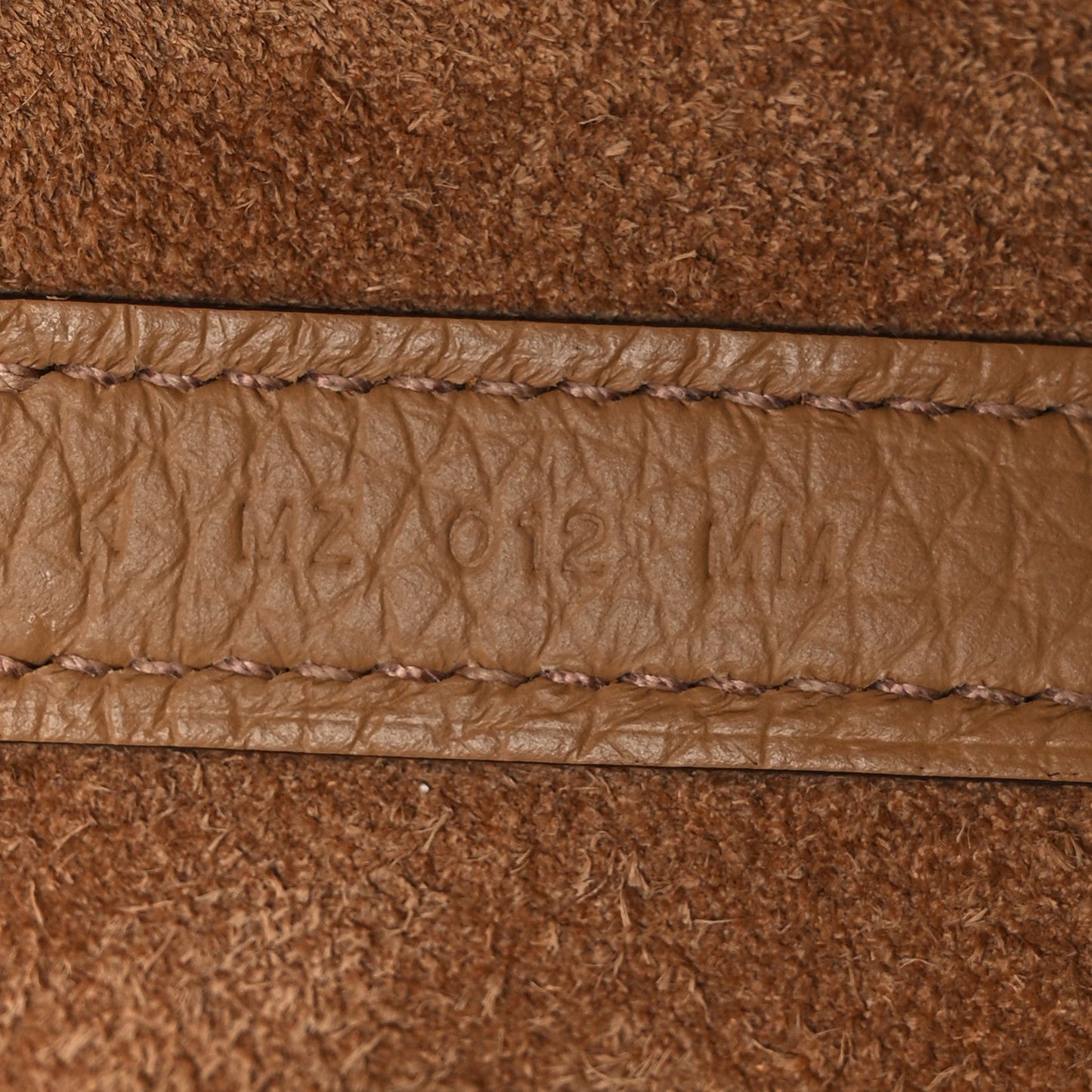 Biscuit textured calfskin bucket bag, stitched panel detail