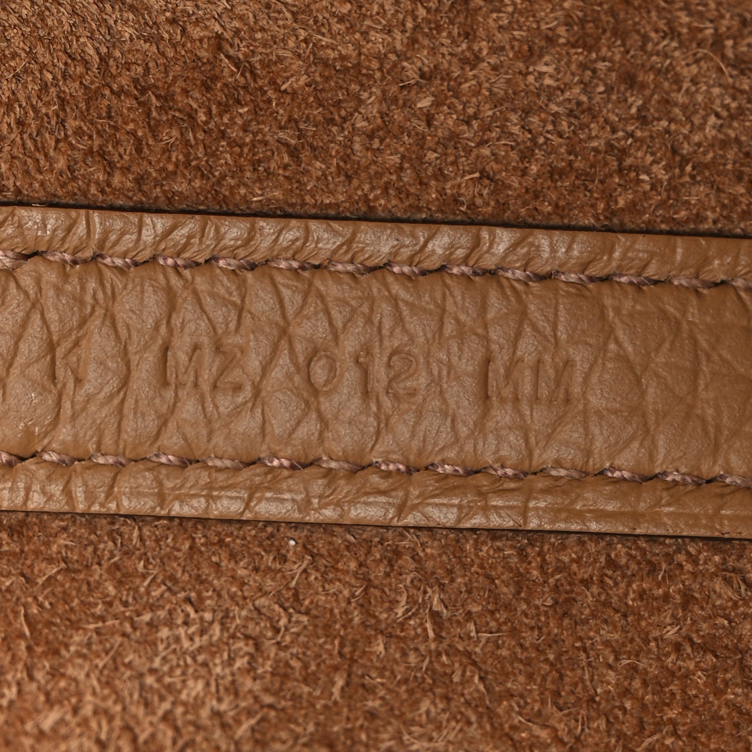 Biscuit textured calfskin bucket bag, stitched panel detail