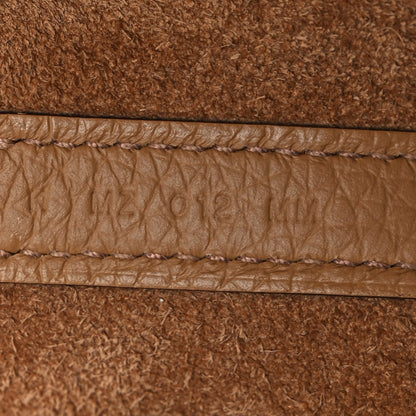 Biscuit textured calfskin bucket bag, stitched panel detail