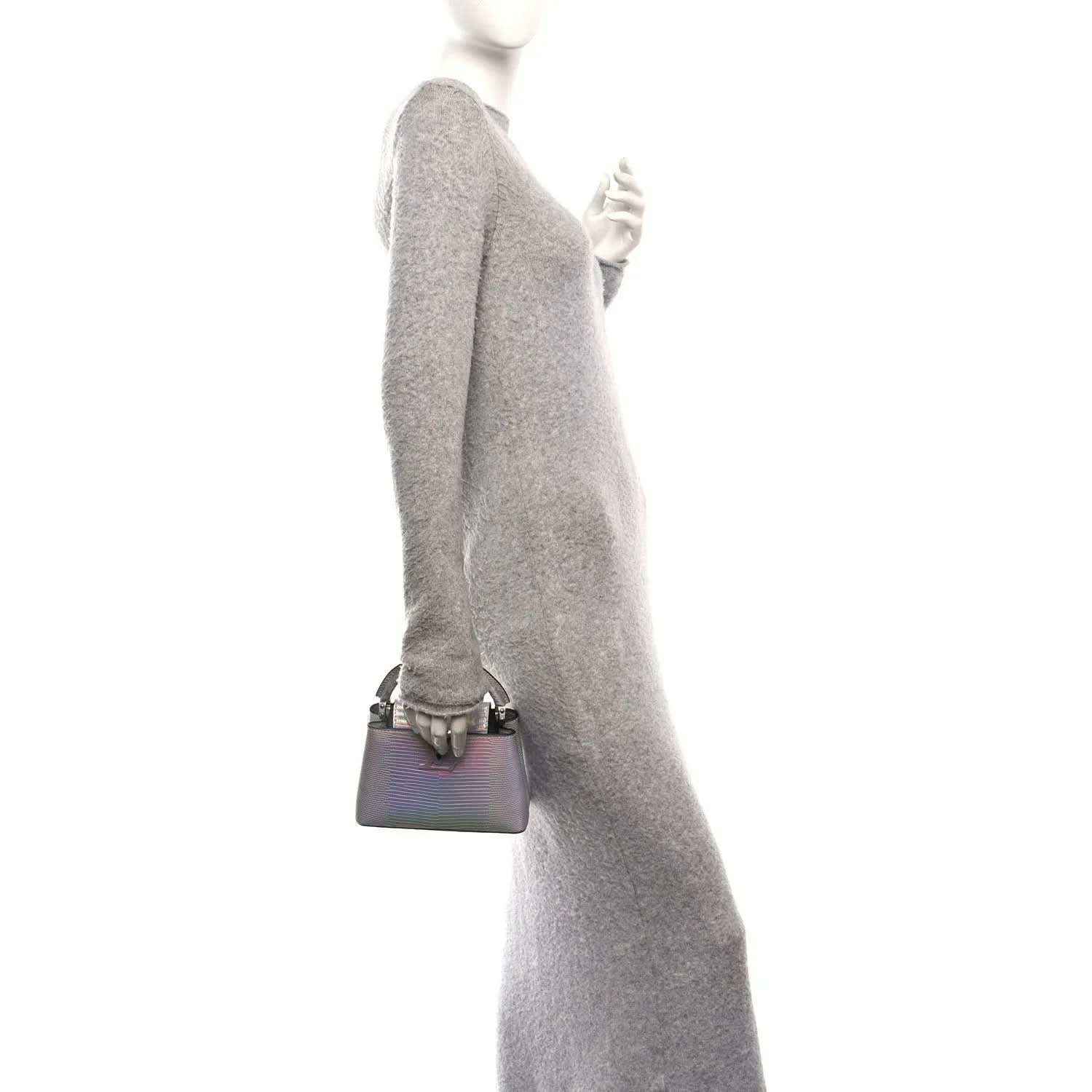 Iridescent lizard mini handbag with short top handle, worn at side