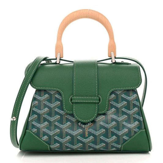 Goyard mini Saigon bag in green chevron canvas with top handle, flap, and crossbody strap
