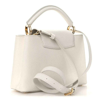Louis Vuitton Capucines BB leather handbag with crossbody strap and front flap