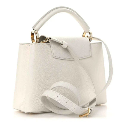 Louis Vuitton Capucines BB leather handbag with crossbody strap and front flap