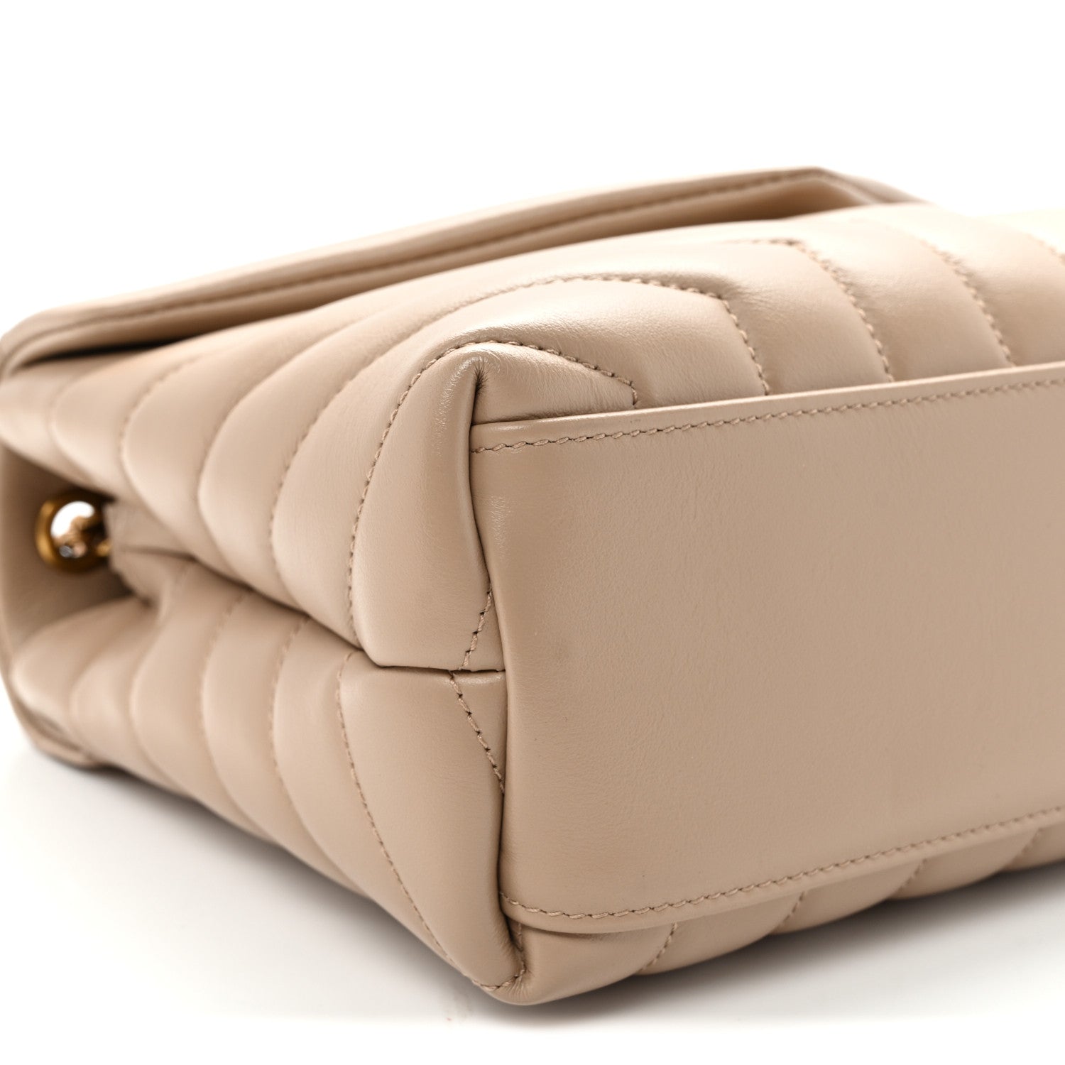 Quilted dark beige satchel corner with stitched panel detail