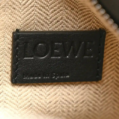 Small Puzzle Edge shoulder bag interior logo patch on beige herringbone lining