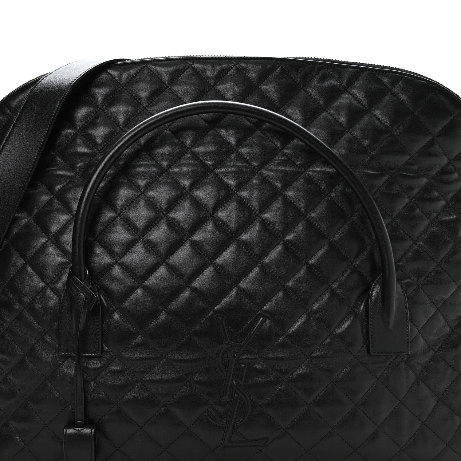 Black quilted leather travel bag with curved handle and embossed monogram on front