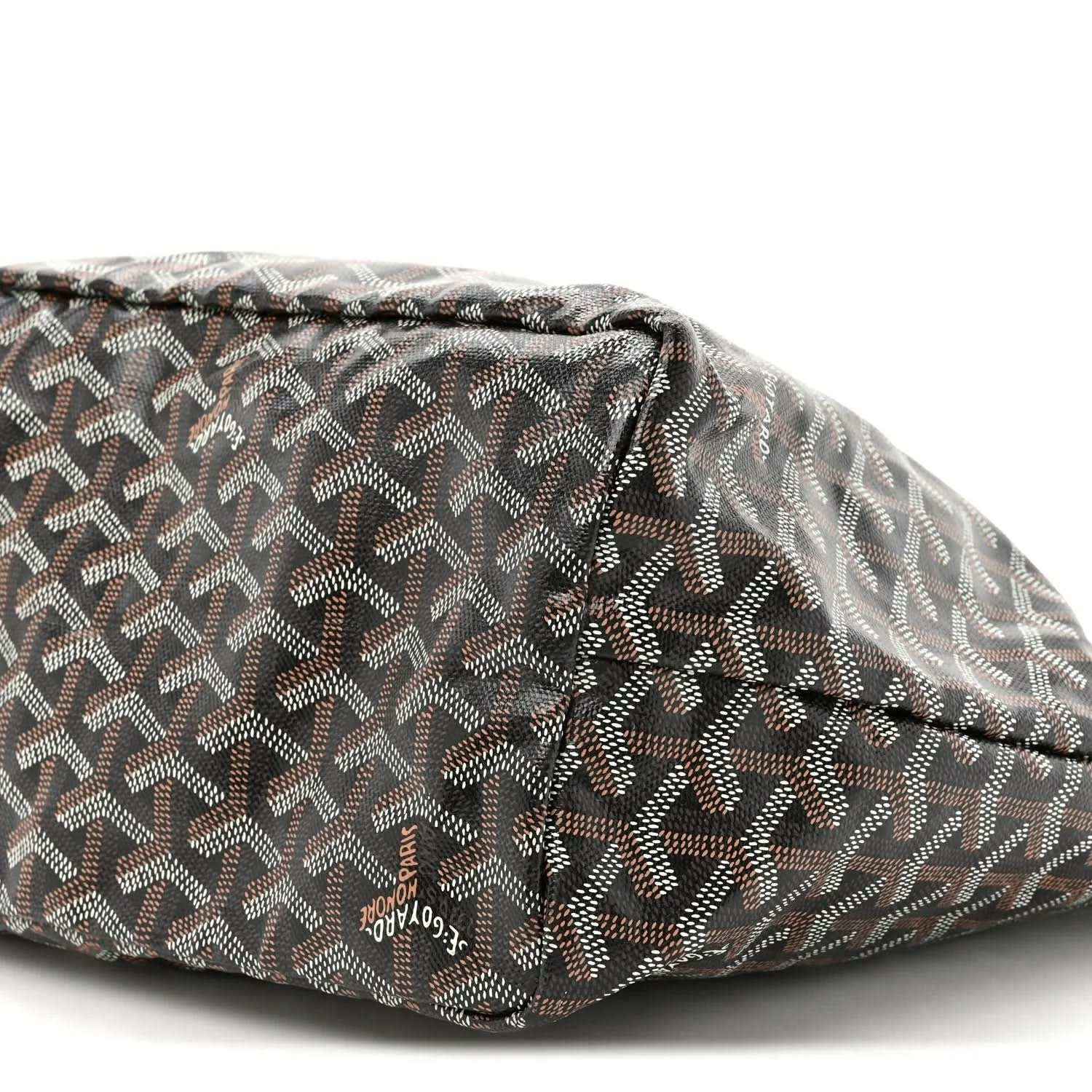 Black patterned pouch bottom with stitched edge and logo stamp