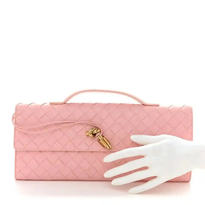Bottega Veneta rose Nappa intrecciato clutch with top handle and brass clasp