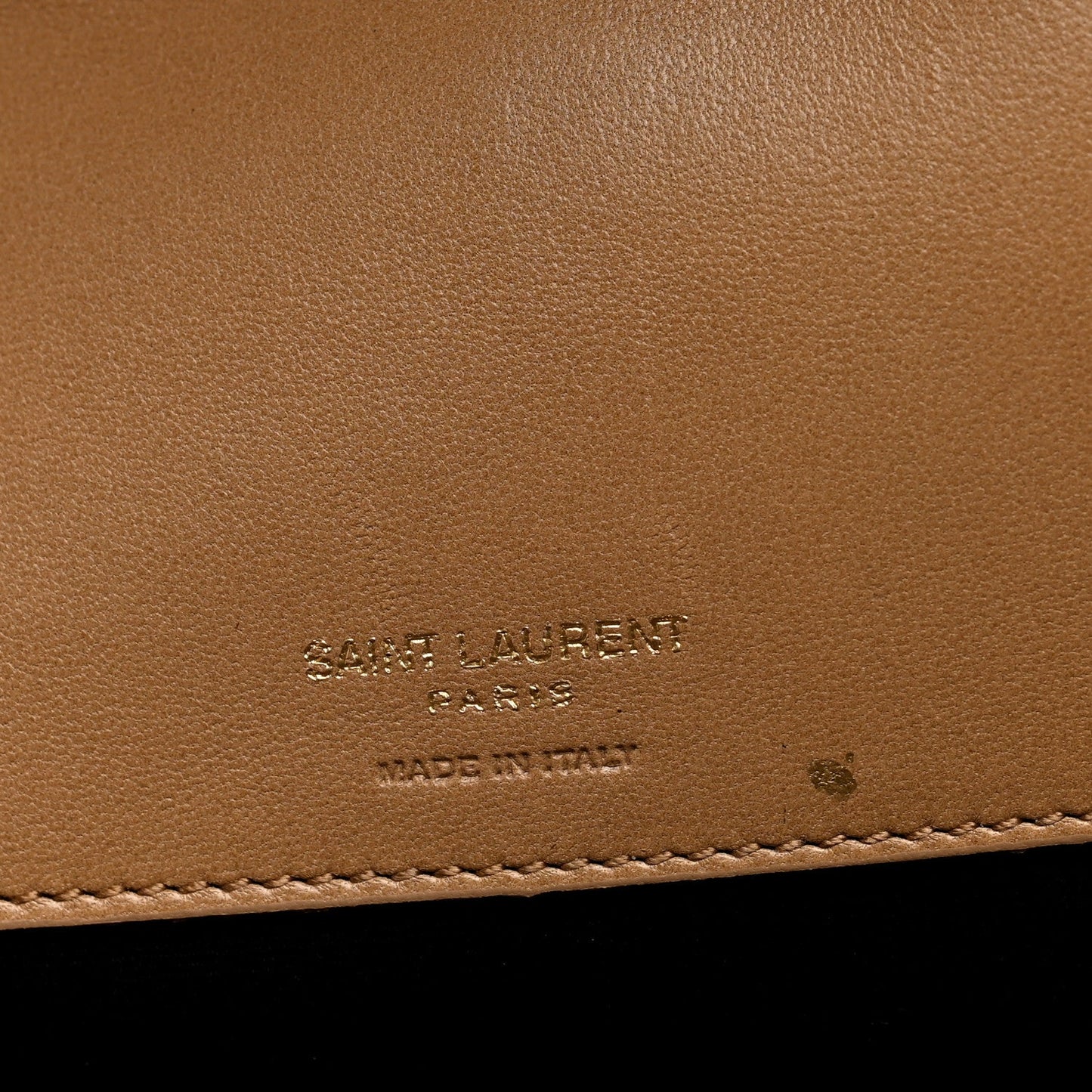 Natural tan leather with embossed SAINT LAURENT Paris markings and stitching