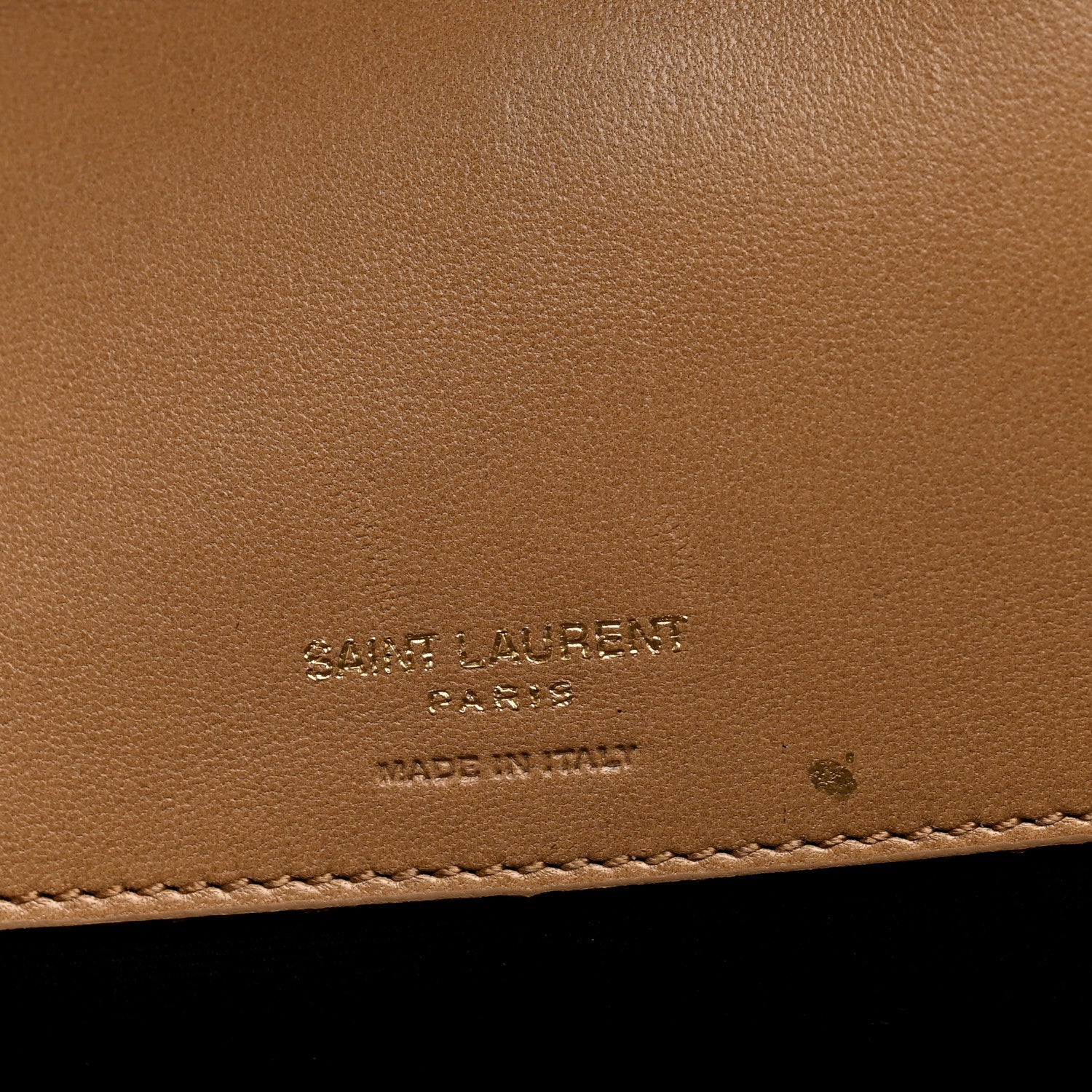 Natural tan leather with embossed SAINT LAURENT Paris markings and stitching