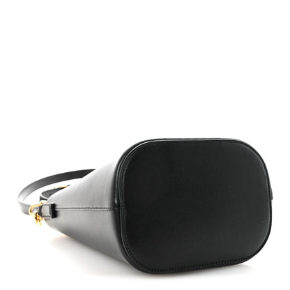 Small black Celine bucket bag, rounded silhouette, smooth leather with shoulder strap
