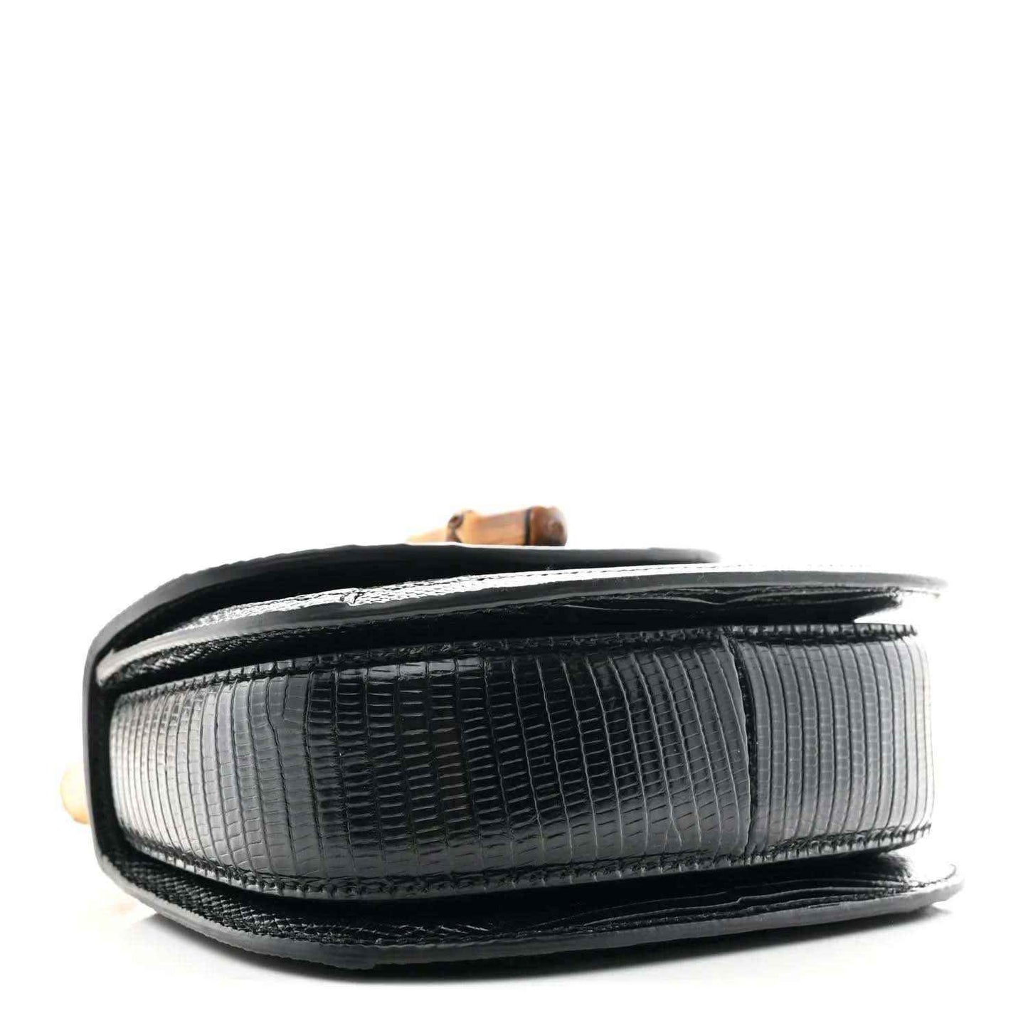 Black mini chain bag with textured side panels and contrast gray interior lining