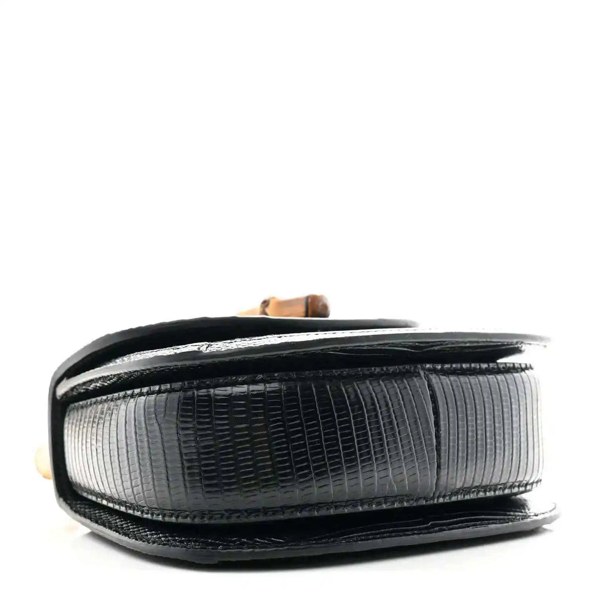 Black mini chain bag with textured side panels and contrast gray interior lining