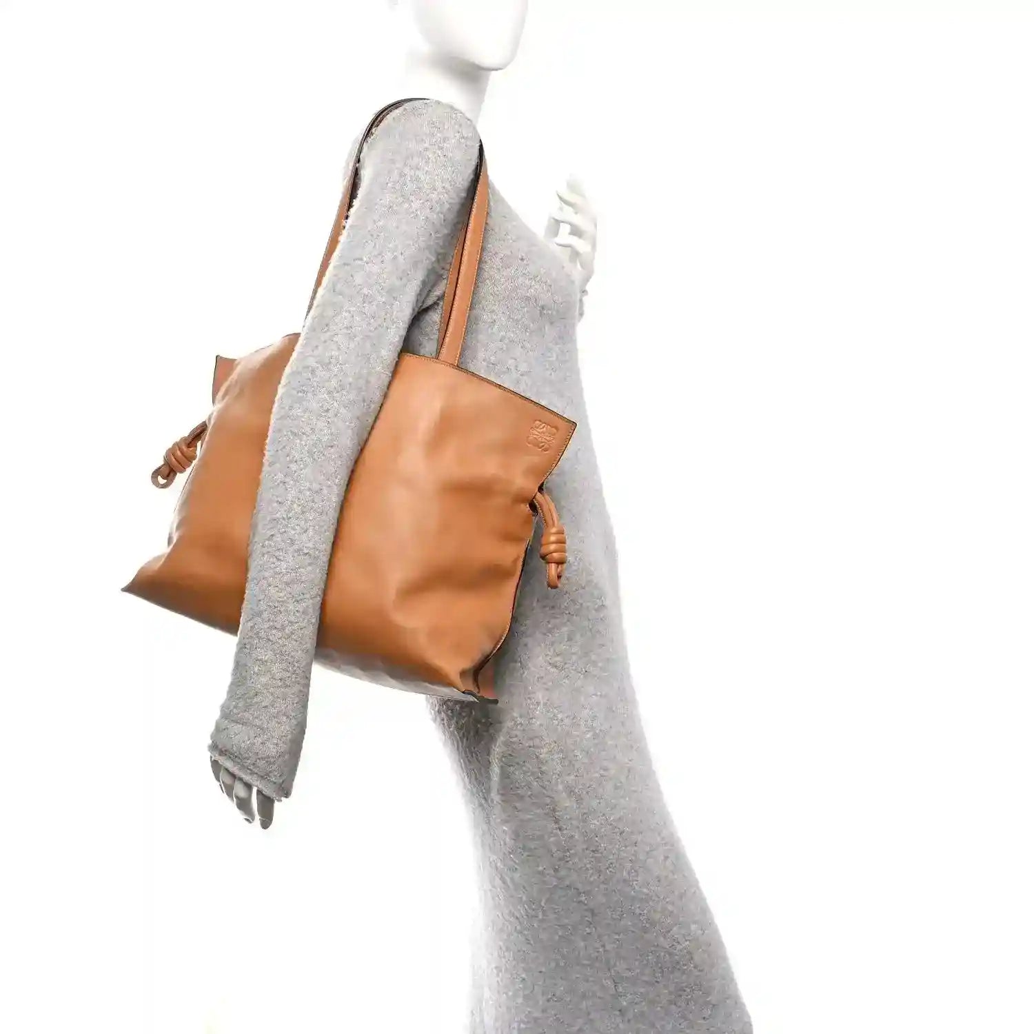 Loewe large Flamenco knot bag with braided leather ties, warm tan calfskin leather.