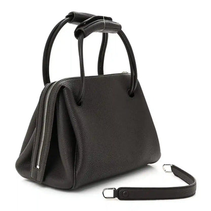 Loewe Madrid medium bag in dark leather with crossbody strap and zip pocket