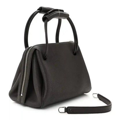 Loewe Madrid medium bag in dark leather with crossbody strap and zip pocket