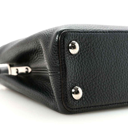 Louis Vuitton Capucines BB black leather corner with round stud hardware