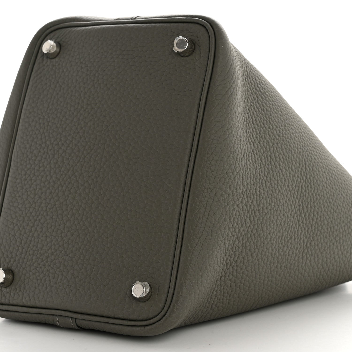 Leather bucket bag side panel with silver-toned snap buttons, dark green