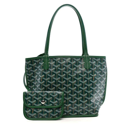 Green reversible mini tote bag with front flap pocket and patterned exterior