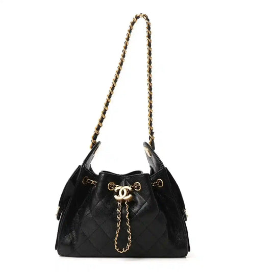 Black leather quilted mini handbag with gold chain and drawstring closure