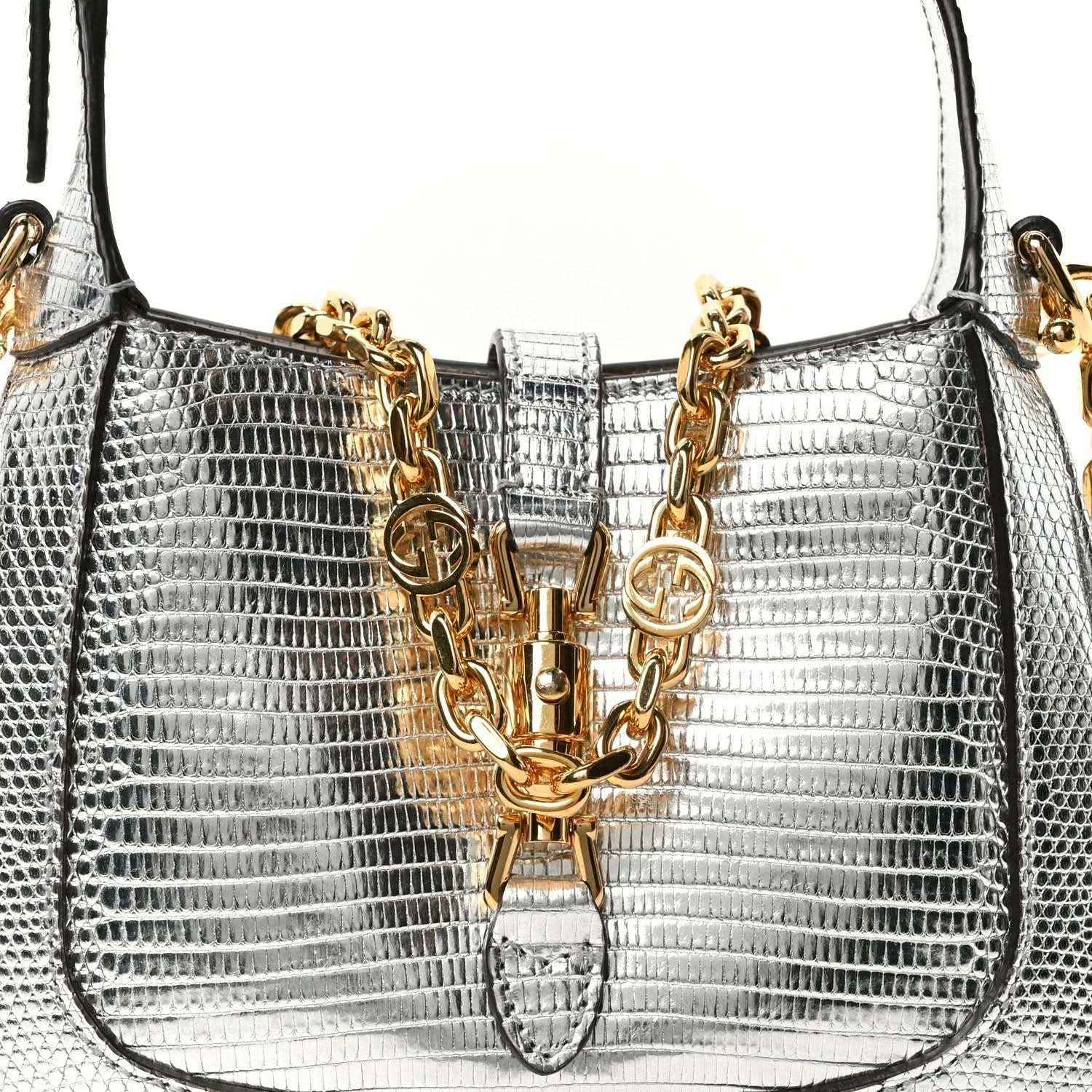 Silver lizard-effect mini shoulder bag front with gold-tone chain detail and clasp