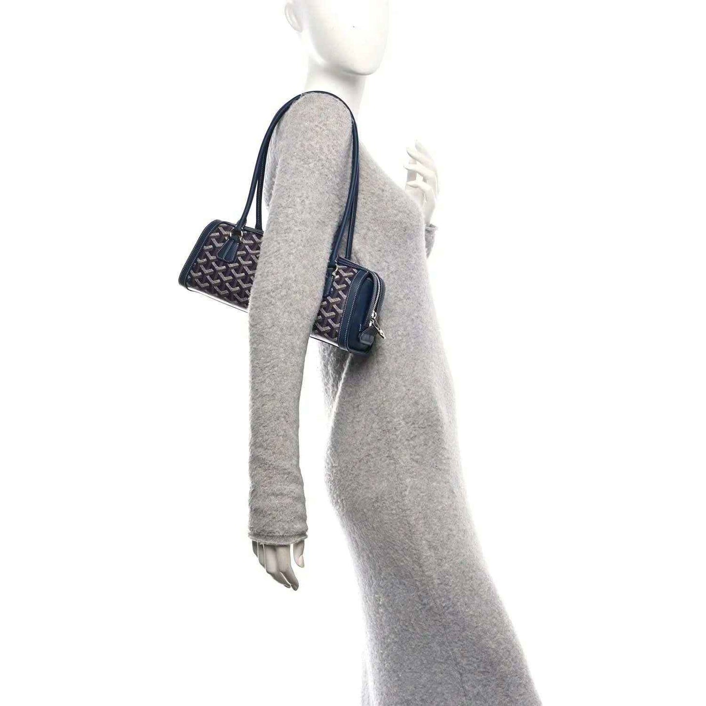 Navy coated canvas Goyardine Bonbonniere bag worn with side strap