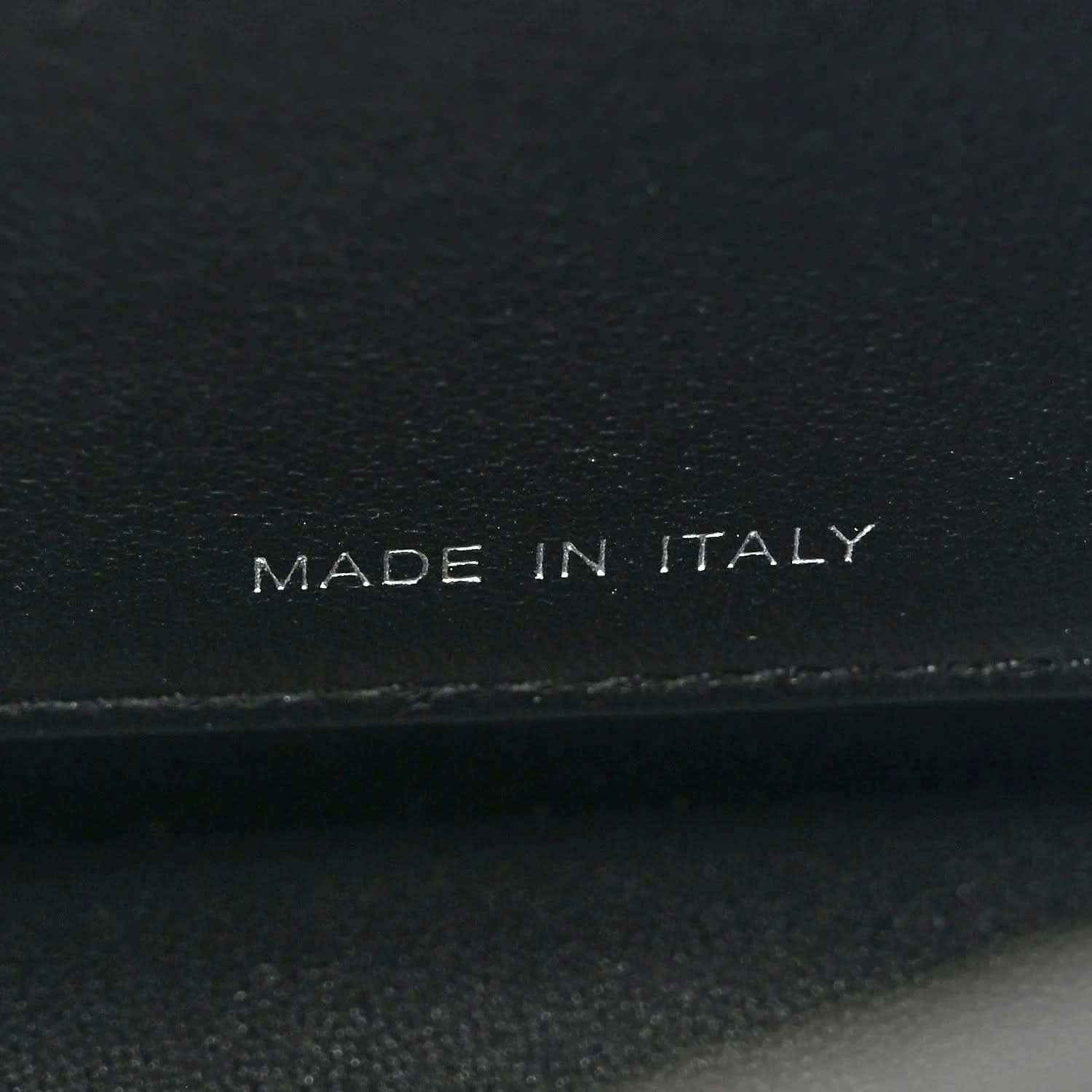 Fendi leather satchel label reading "MADE IN ITALY"